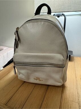 Coach Mini Charlie Backpack in Pebbled Cream-Colored Leather with Gold Hardware